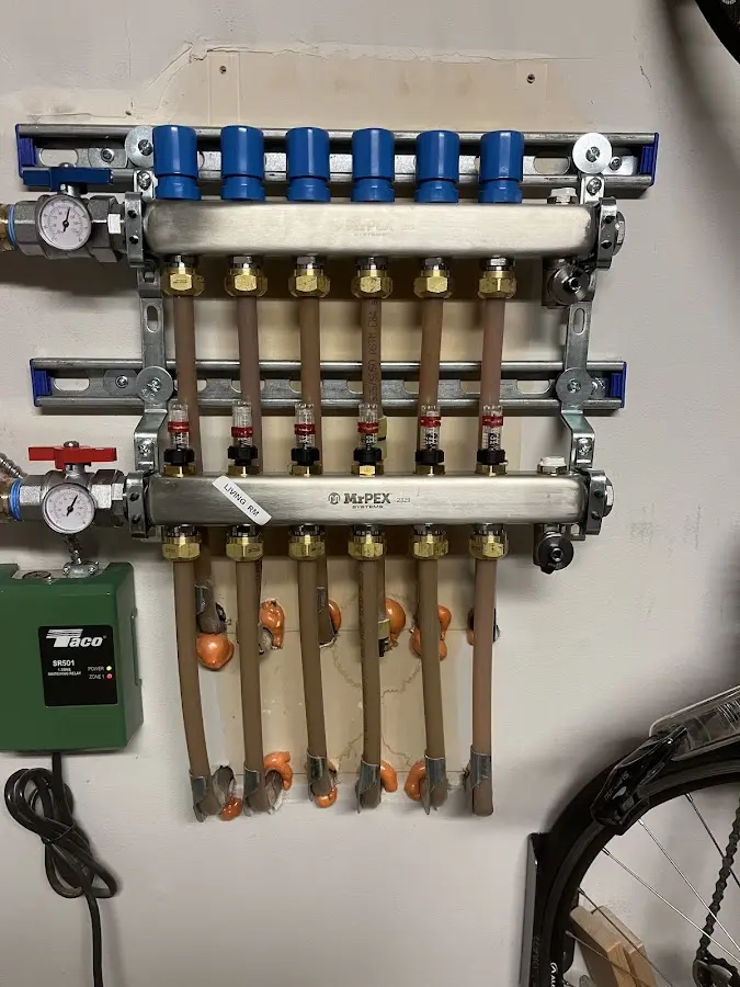 Plumber performing Gas Leak Detection at a residential property in Piqua